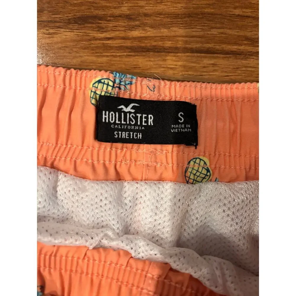 Hollister men’s small mesh lined swim trunks orange with yellow pineapples